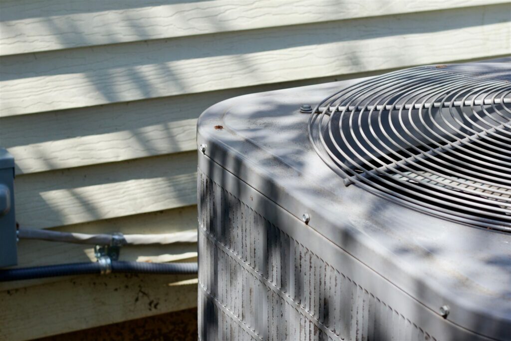 Outdoor AC condenser unit after system replacement